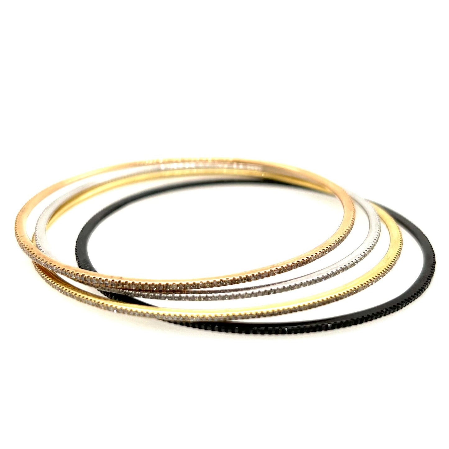 Four Multicolor Gold Diamond Bangles